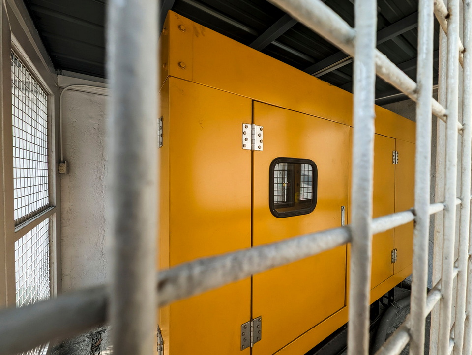 An old but well-maintained diesel generator still in operation